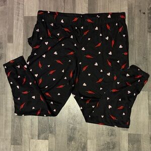 Black Pajama pants featuring hearts and peppers.